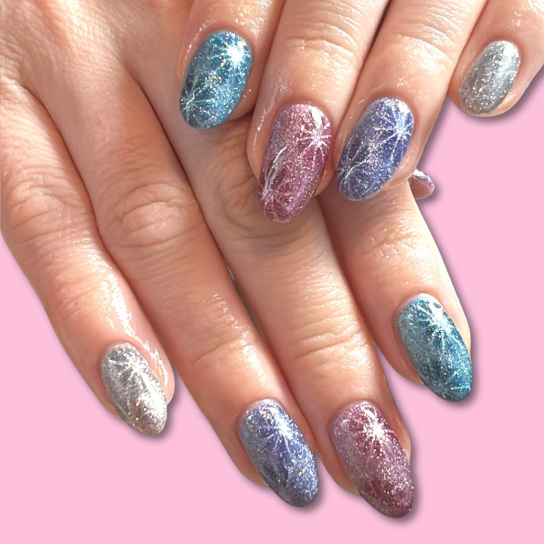 Sparkly press on false nails with magnetic star burst design to replicate a firework effect. bespoke press on nail set, made to size small, medium, large or bespoke nail sizes